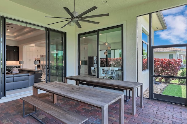 9219 Grand Prix Ln, Boynton Beach, FL 33472 - sunroom / solarium with a ceiling fan