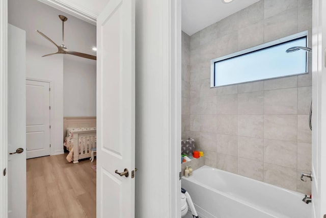 9219 Grand Prix Ln, Boynton Beach, FL 33472 - full bath with wood finished floors, tub / shower combination, and ceiling fan