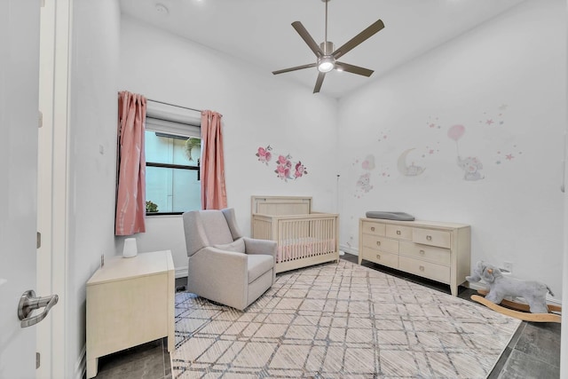 9219 Grand Prix Ln, Boynton Beach, FL 33472 - bedroom with a crib and ceiling fan