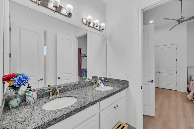 9219 Grand Prix Ln, Boynton Beach, FL 33472 - full bath with wood finished floors and double vanity