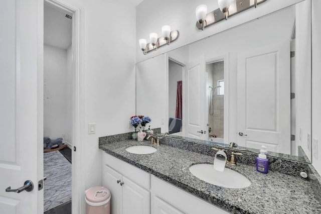 9219 Grand Prix Ln, Boynton Beach, FL 33472 - bathroom featuring a shower and double vanity