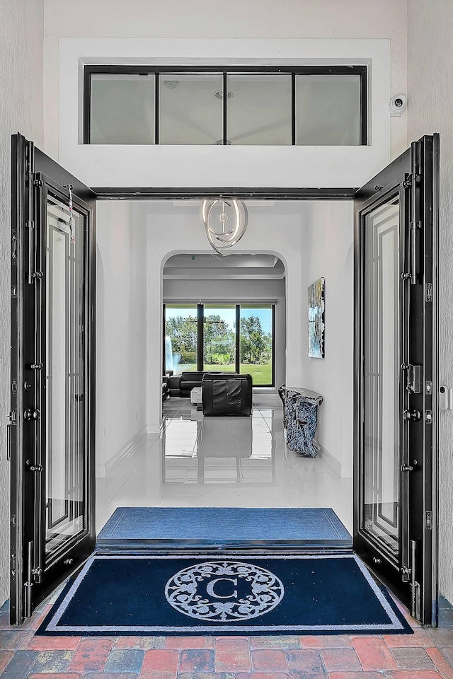 9219 Grand Prix Ln, Boynton Beach, FL 33472 - view of exterior entry with an outdoor living space