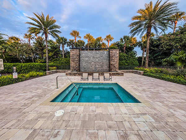 9219 Grand Prix Ln, Boynton Beach, FL 33472 - view of pool with a pool and a patio