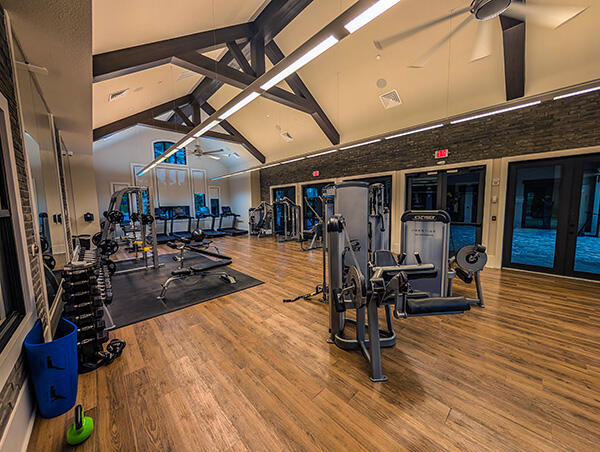 9219 Grand Prix Ln, Boynton Beach, FL 33472 - workout area featuring high vaulted ceiling, wood finished floors, beamed ceiling, and a ceiling fan