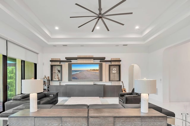 9219 Grand Prix Ln, Boynton Beach, FL 33472 - living area with a raised ceiling, arched walkways, and recessed lighting
