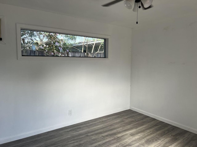 132 E Central Blvd, Lantana, FL 33462 - unfurnished room featuring ceiling fan, dark wood-style floors, and baseboards