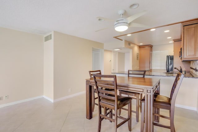 4411 Trevi Ct Unit 303, Lake Worth, FL 33467 - dining space featuring a ceiling fan, recessed lighting, a textured ceiling, baseboards, and light tile patterned floors