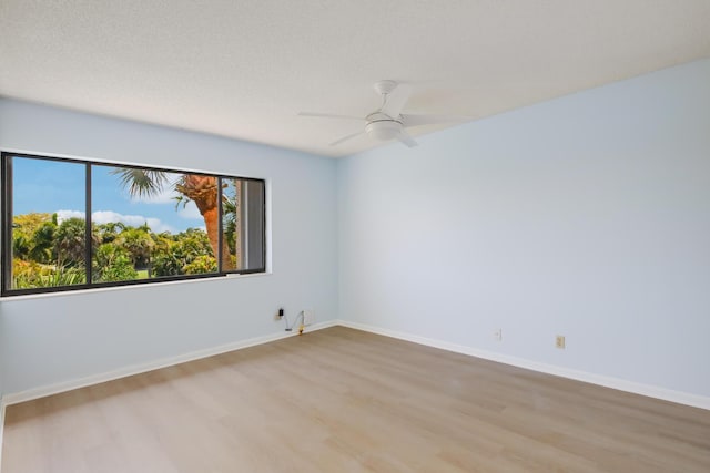 4411 Trevi Ct Unit 303, Lake Worth, FL 33467 - spare room featuring light wood-type flooring, baseboards, and ceiling fan