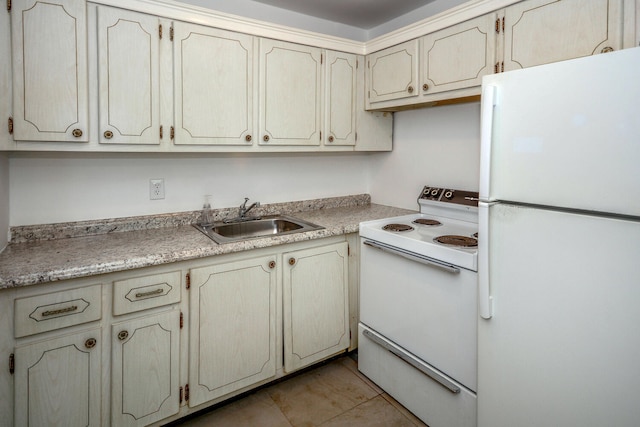 134 Southampton Unit B, West Palm Beach, FL 33417 - kitchen with white appliances, a sink, and light countertops