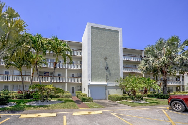 134 Southampton Unit B, West Palm Beach, FL 33417 - view of apartment building / complex featuring uncovered parking