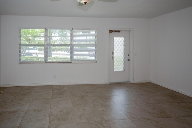 134 Southampton Unit B, West Palm Beach, FL 33417 - spare room featuring ceiling fan