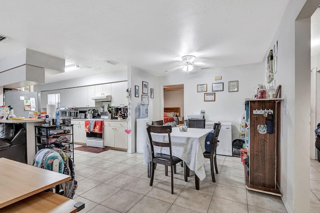 6528/6530 12th St W, Bradenton, FL 34207 - dining room featuring a ceiling fan and light tile patterned floors
