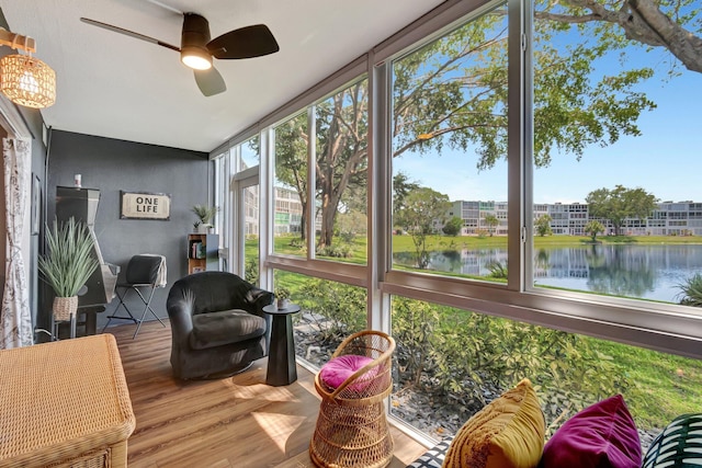 1044 Cambridge C Unit 1044, Deerfield Beach, FL 33442 - sunroom featuring a ceiling fan, vaulted ceiling, and a water view