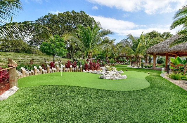 1044 Cambridge C Unit 1044, Deerfield Beach, FL 33442 - view of community with a putting area