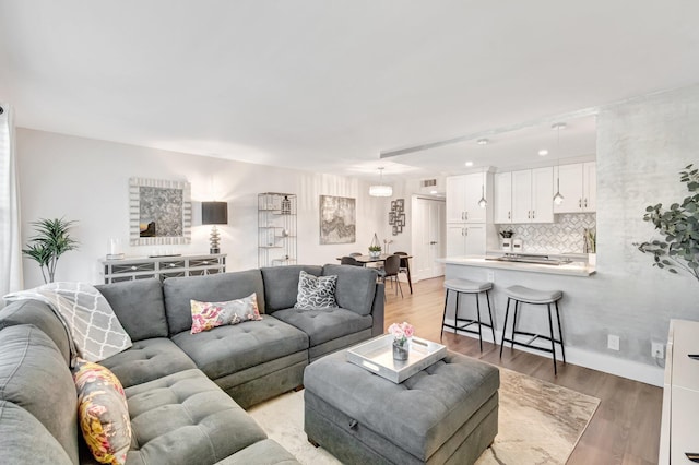 1044 Cambridge C Unit 1044, Deerfield Beach, FL 33442 - living area with light wood finished floors and recessed lighting