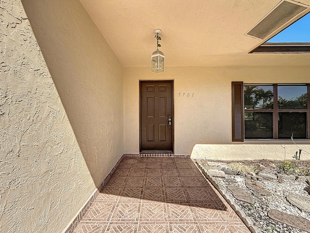 5701 Autumn Ridge Rd, Lake Worth, FL 33463 - view of exterior entry with stucco siding