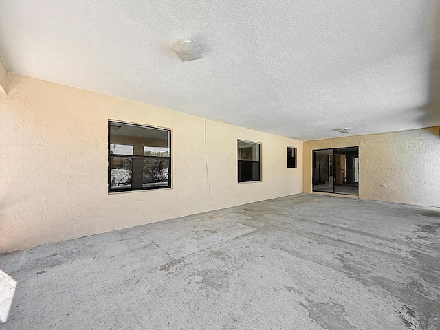 5701 Autumn Ridge Rd, Lake Worth, FL 33463 - doorway to property featuring a patio area and stucco siding