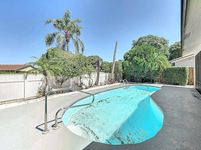 5701 Autumn Ridge Rd, Lake Worth, FL 33463 - view of swimming pool with a fenced backyard and a patio