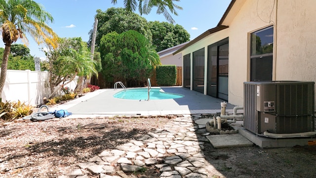 5701 Autumn Ridge Rd, Lake Worth, FL 33463 - view of pool with cooling unit, a fenced backyard, and a patio