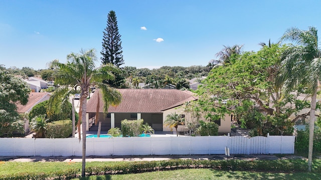 5701 Autumn Ridge Rd, Lake Worth, FL 33463 - view of front of house with a fenced front yard and stucco siding