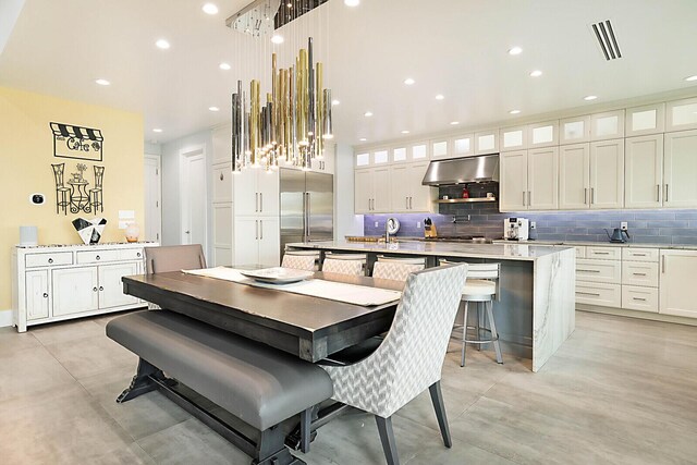 311 SE 11th St, Pompano Beach, FL 33060 - dining area featuring recessed lighting