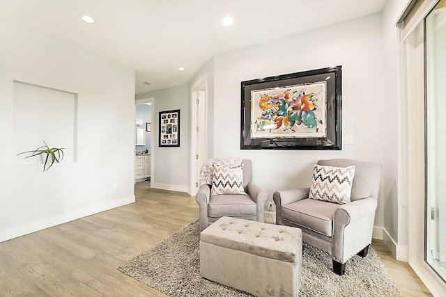 311 SE 11th St, Pompano Beach, FL 33060 - sitting room with light wood-style floors, recessed lighting, and baseboards