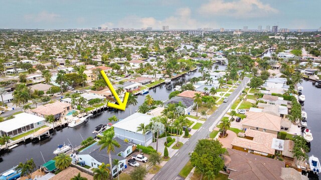 311 SE 11th St, Pompano Beach, FL 33060 - aerial view of residential area with a skyline view and a large body of water
