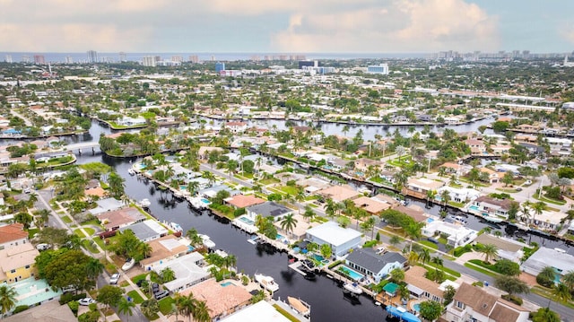 311 SE 11th St, Pompano Beach, FL 33060 - aerial view of property and surrounding area featuring a large body of water, nearby urban area, and nearby suburban area