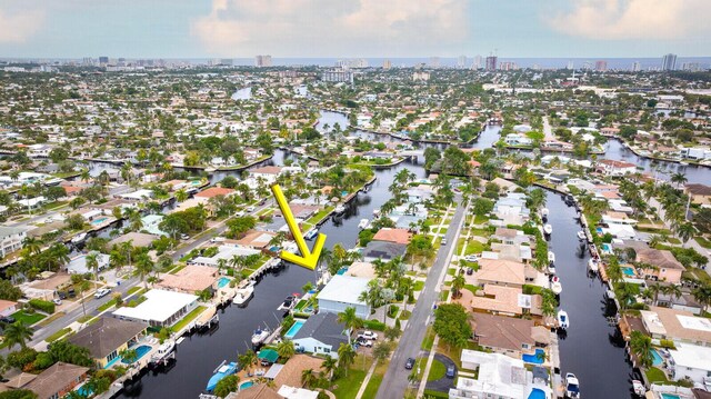 311 SE 11th St, Pompano Beach, FL 33060 - aerial view of property's location with nearby urban area, a large body of water, and nearby suburban area