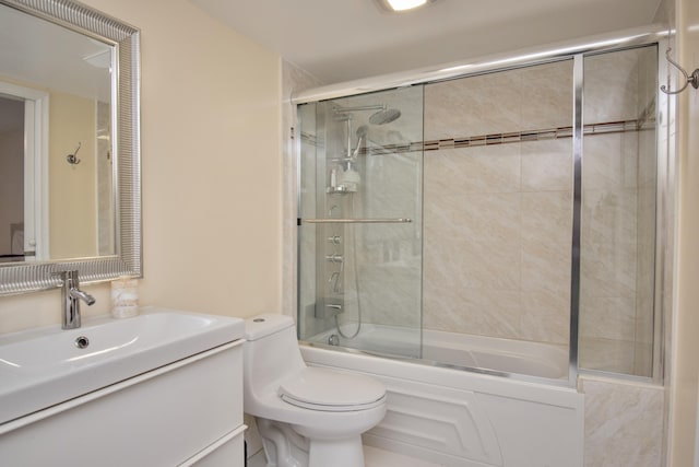 2301 Lucaya Ln Unit M3, Coconut Creek, FL 33066 - bathroom with vanity, toilet, and shower / bath combination with glass door