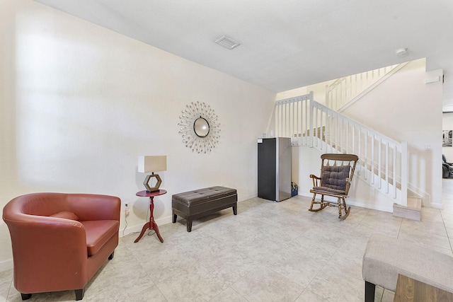 4080 Devenshire Ct, Coconut Creek, FL 33073 - sitting room with stairway and baseboards
