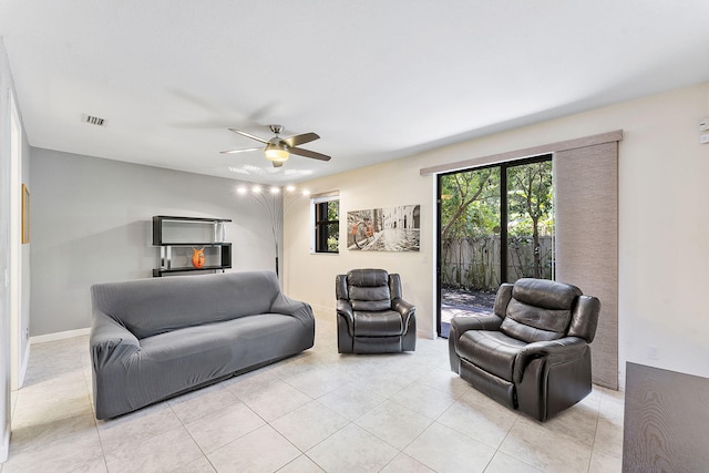4080 Devenshire Ct, Coconut Creek, FL 33073 - living room with light tile patterned floors and a ceiling fan