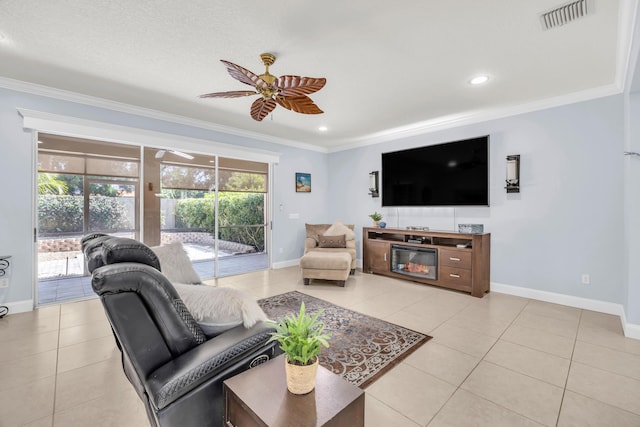 148 Cypress Cv, Jupiter, FL 33458 - living room featuring crown molding, ceiling fan, baseboards, light tile patterned floors, and recessed lighting