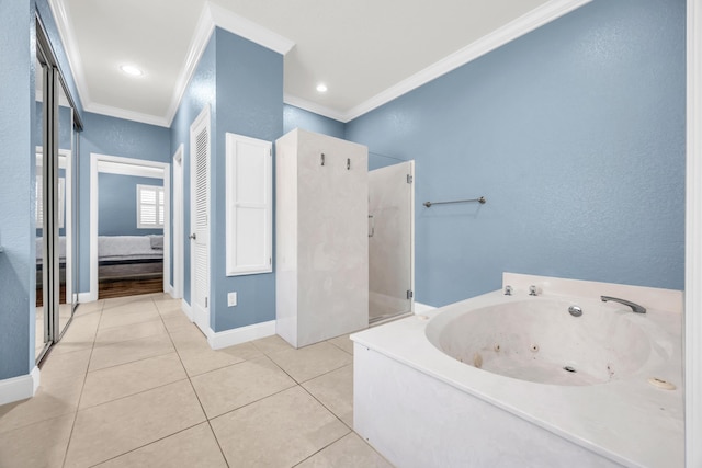 148 Cypress Cv, Jupiter, FL 33458 - bathroom featuring crown molding, a walk in shower, a whirlpool tub, tile patterned floors, and baseboards