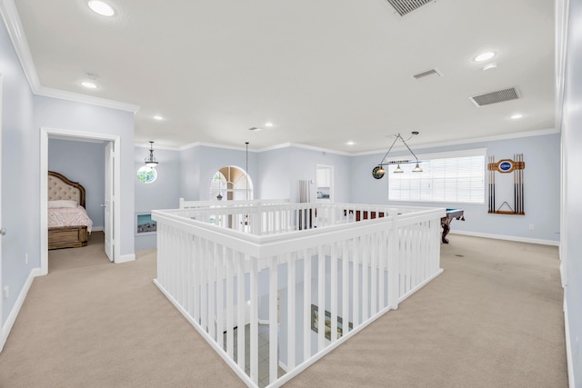 148 Cypress Cv, Jupiter, FL 33458 - hallway with light colored carpet, baseboards, crown molding, recessed lighting, and plenty of natural light