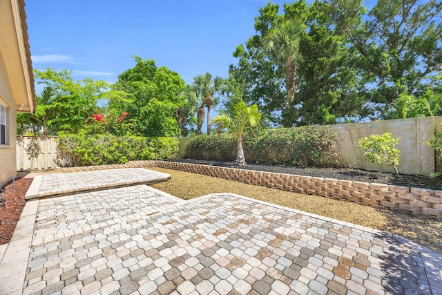 148 Cypress Cv, Jupiter, FL 33458 - view of patio / terrace featuring a fenced backyard