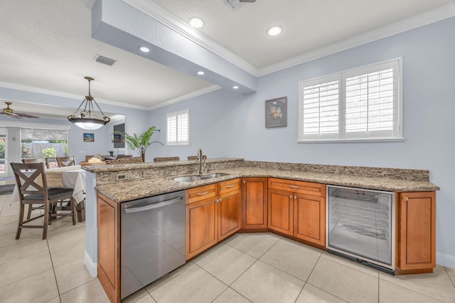 148 Cypress Cv, Jupiter, FL 33458 - kitchen featuring stainless steel dishwasher, a sink, wine cooler, brown cabinetry, and crown molding