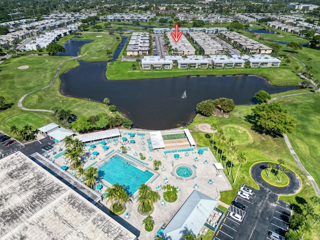 128 Capri C, Delray Beach, FL 33484 - drone / aerial view of a nearby body of water, a pool, and a golf course