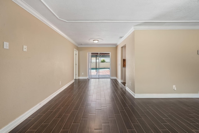318 Gale Pl, West Palm Beach, FL 33409 - empty room featuring dark wood finished floors, baseboards, and ornamental molding