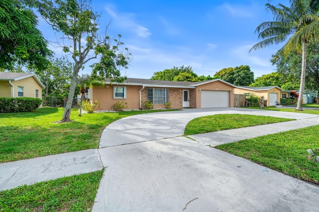 318 Gale Pl, West Palm Beach, FL 33409 - single story home featuring a garage, concrete driveway, and stucco siding