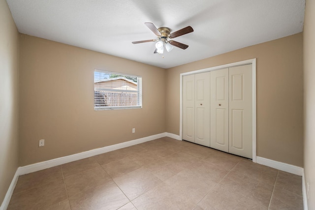 318 Gale Pl, West Palm Beach, FL 33409 - unfurnished bedroom with baseboards, a closet, and ceiling fan