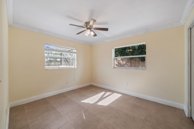 318 Gale Pl, West Palm Beach, FL 33409 - spare room with ornamental molding, baseboards, ceiling fan, and tile patterned flooring