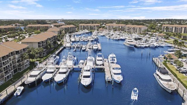aerial view of numerous boat docks and a nearby body of water