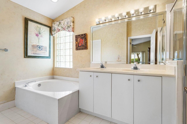7338 Chorale Rd, Boynton Beach, FL 33437 - full bath featuring tile patterned flooring, double vanity, a garden tub, and an enclosed shower