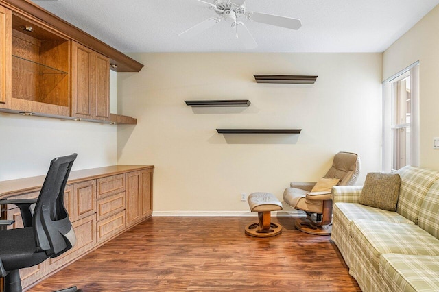 7338 Chorale Rd, Boynton Beach, FL 33437 - office area with dark wood finished floors, ceiling fan, and baseboards