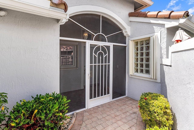 7338 Chorale Rd, Boynton Beach, FL 33437 - entrance to property featuring stucco siding