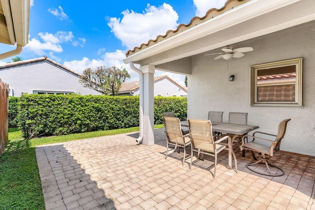 7338 Chorale Rd, Boynton Beach, FL 33437 - view of patio with a ceiling fan, outdoor dining area, and fence