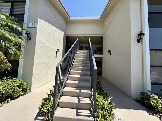 1453 Lake Crystal Dr Unit H, West Palm Beach, FL 33411 - property entrance featuring stucco siding