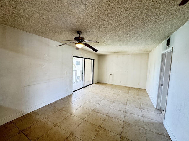 1453 Lake Crystal Dr Unit H, West Palm Beach, FL 33411 - unfurnished room featuring ceiling fan, a textured ceiling, baseboards, and light tile patterned floors