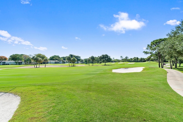 6 Stratford Dr E Unit D, Boynton Beach, FL 33436 - view of property's community with view of golf course and a yard